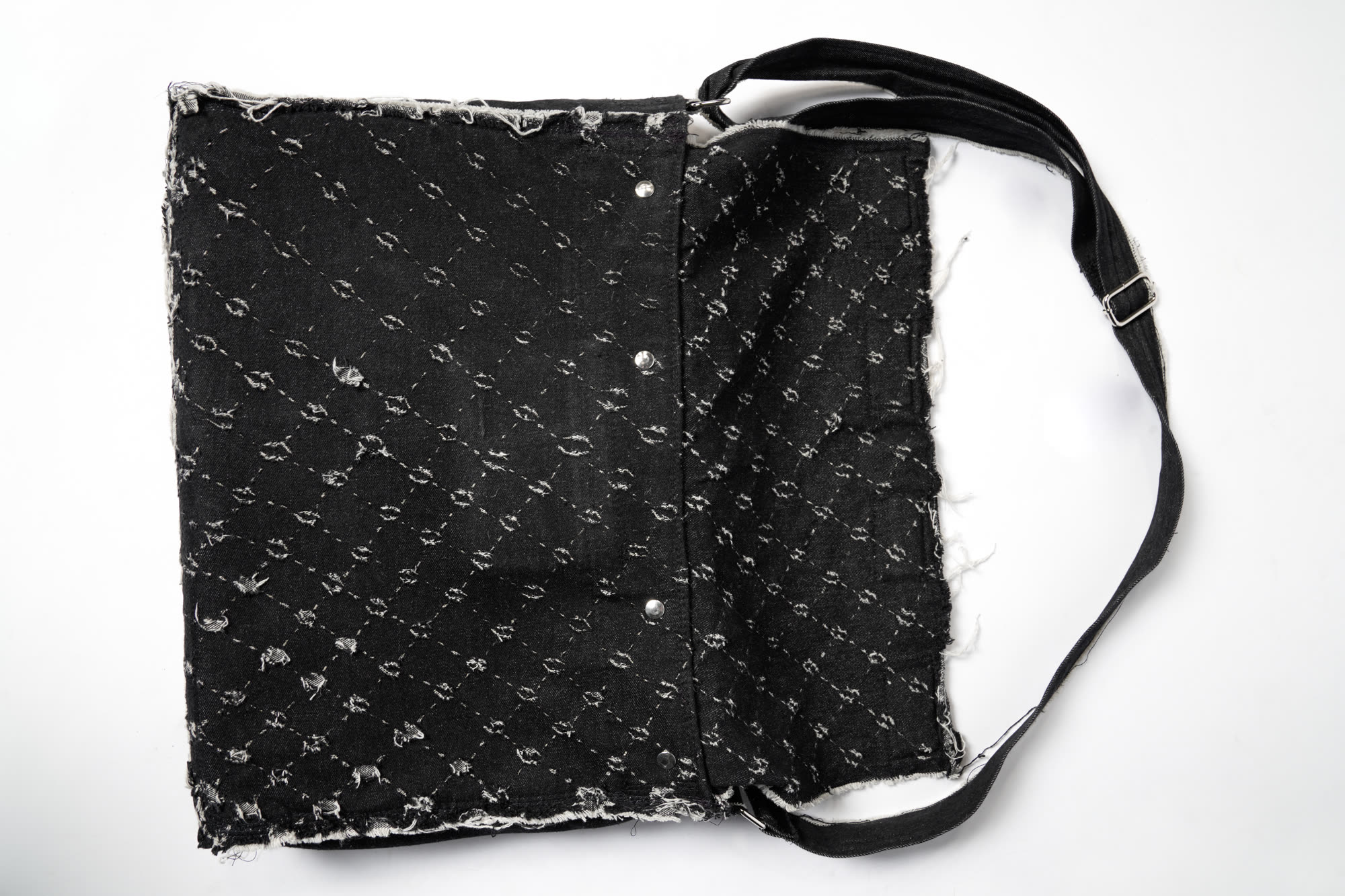 Denim bag, held